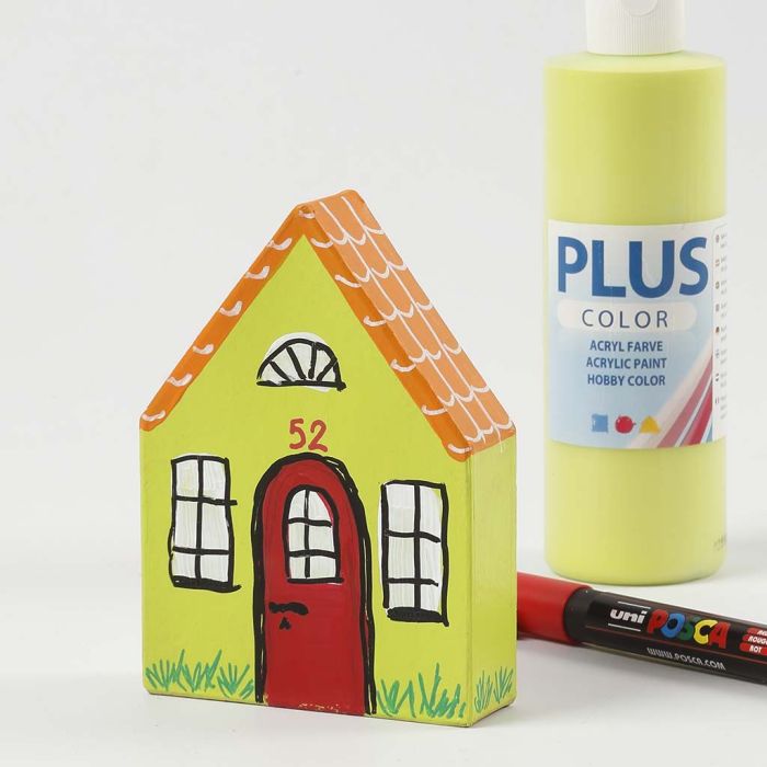 A painted Papier-Mâché House with drawn Details