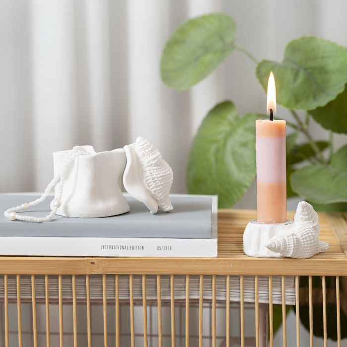 Portavelas y tarro con conchas