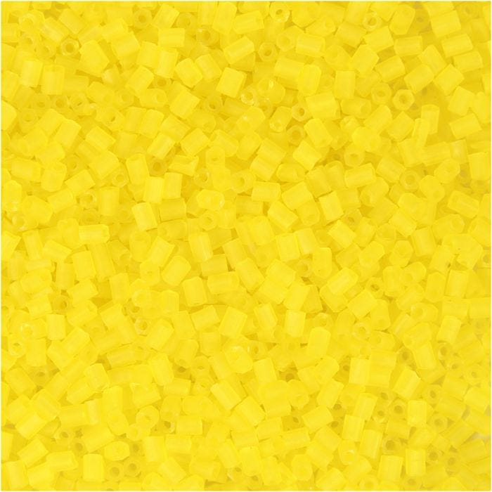 Rocalla cuenta 2 cortes, dia 1,7 mm, medidas 15/0, medida agujero 0,5 mm, amarillo transparente, 25 gr/ 1 paquete