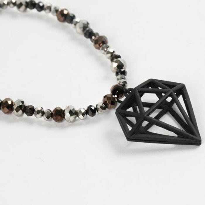 A Necklace with faceted Beads and a Diamond Pendant