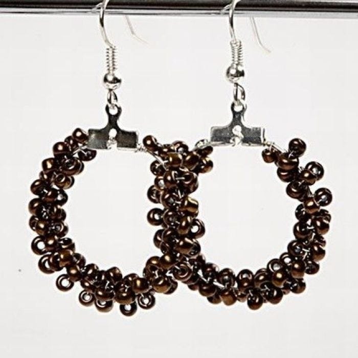 Round earrings with rocaille seed beads.