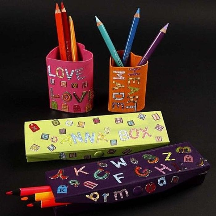 A Pencil Case and a Pencil Holder with Letters