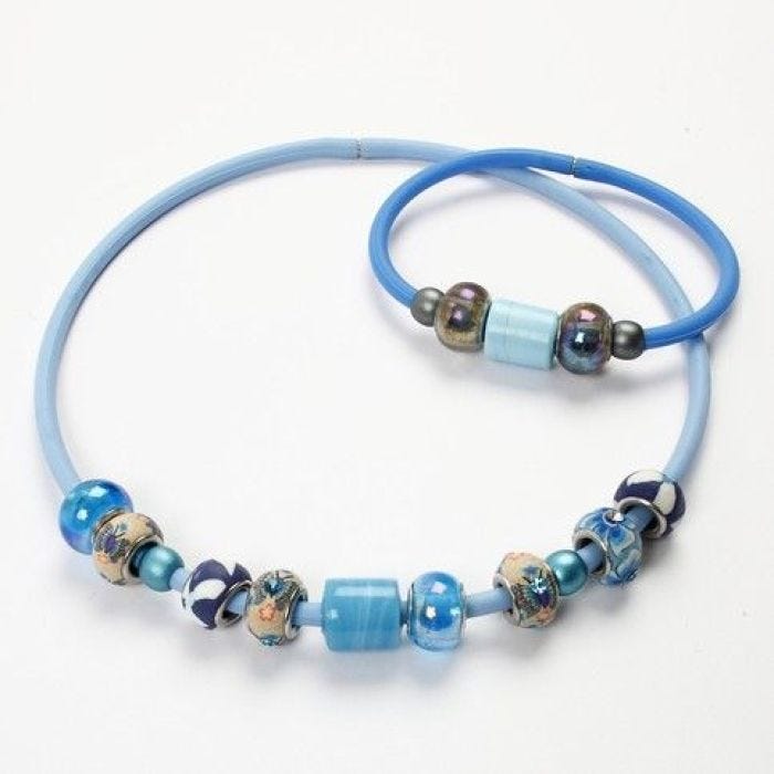 A Silicone Necklace with Glass Beads and Clay Beads