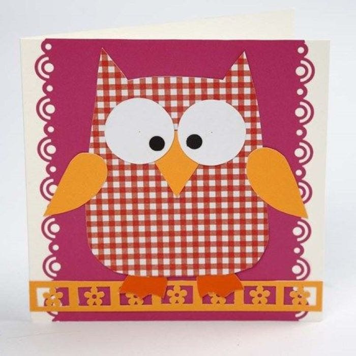 A Greeting Card with an Owl Design and a Laced Border
