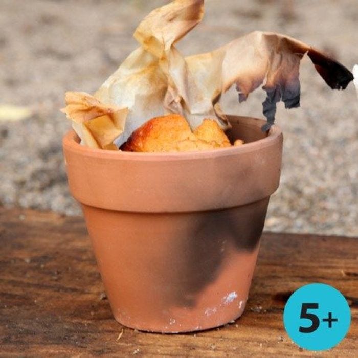 Bread made on a Bonfire in a Lined Red Terracotta Flower Pot