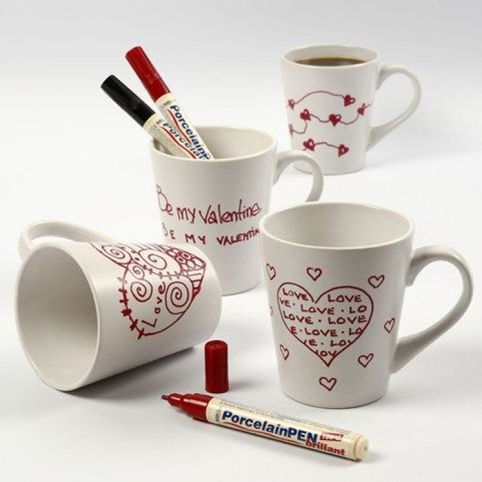 A white porcelain Mug with red Love Motifs