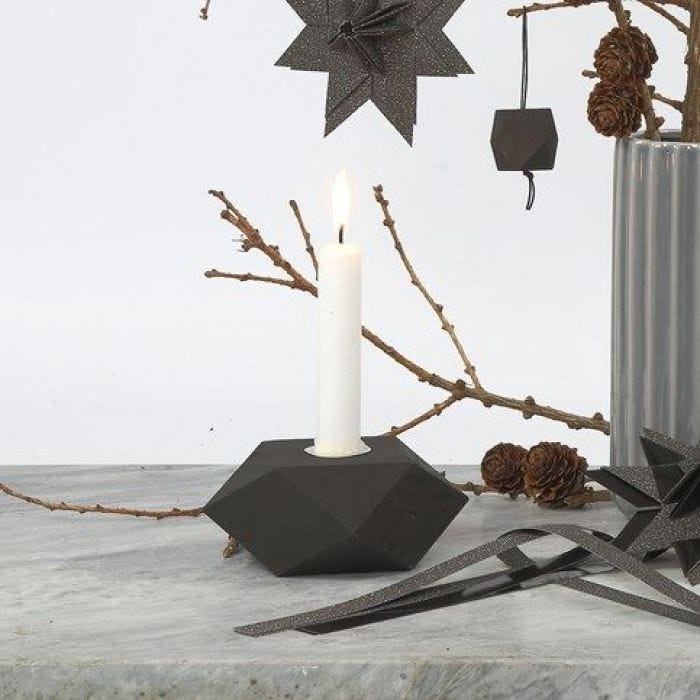 A black-painted geometrically shaped Candlestick