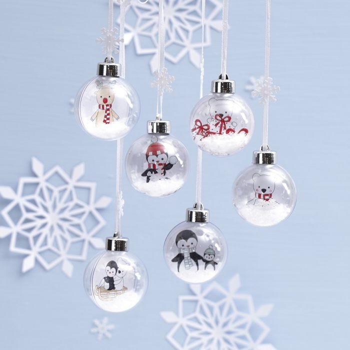 Bolas de Navidad con un dibujo de animales en el interior para decorar