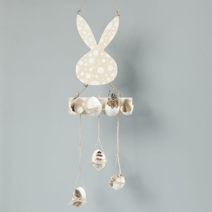 An Easter hanging decoration with eggs and feathers