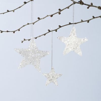Decoraciones colgantes de estrellas brillantes hechas de Sticky Base y purpurina