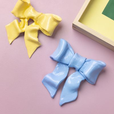 Lazo decorativo de arcilla de secado al aire