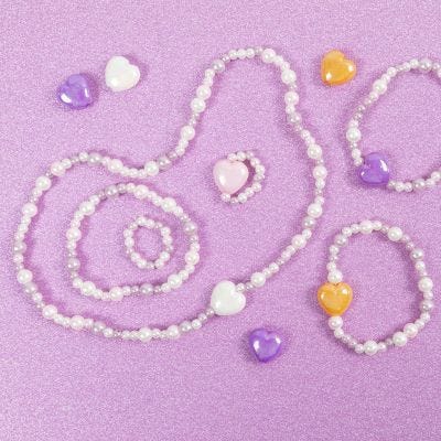 Joyería con cuentas de madera y perlas de cera
