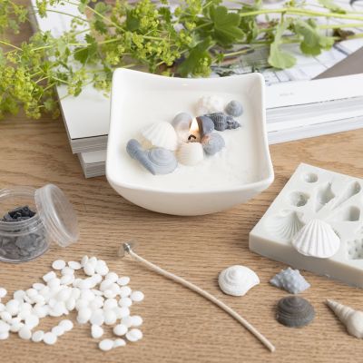 Plato para vela con conchas de playa