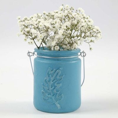 Porta velas pintado con una pluma en relieve