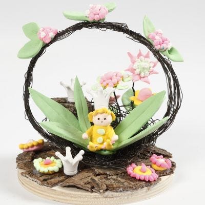 Un mundo en miniatura con una hada y flores