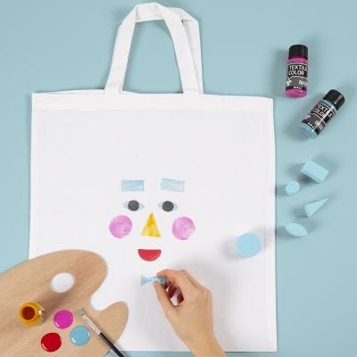 Una bolsa de la compra con diseño de cara