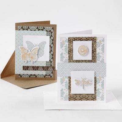 Tarjetas de felicitación decoradas con papel de diseño y diseños troquelados con lámina decorativa.