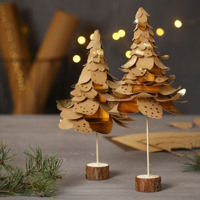Árboles de Navidad de papel imitación cuero perforado en capas