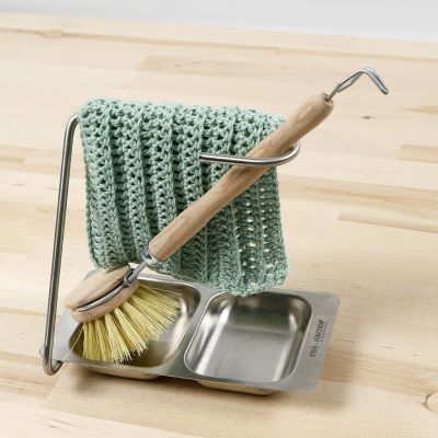 Un paño de cocina tejido a ganchillo en un estilo de patrón acanalado 