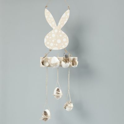 An Easter hanging decoration with eggs and feathers