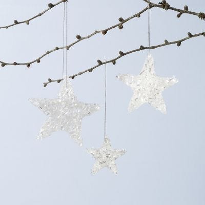 Decoraciones colgantes de estrellas brillantes hechas de Sticky Base y purpurina