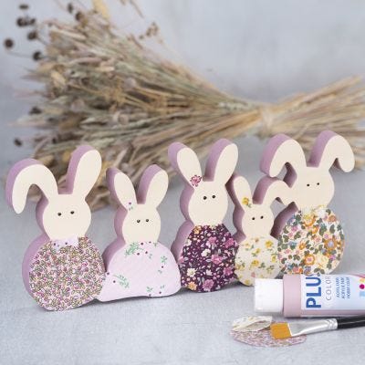 Una familia de conejos con decoupage de tela