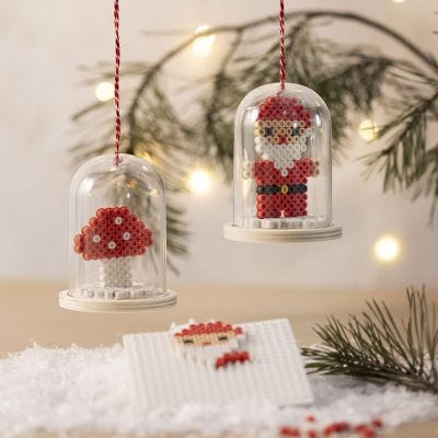Campana de Navidad con Papá Noel y seta en cuentas ecológicas