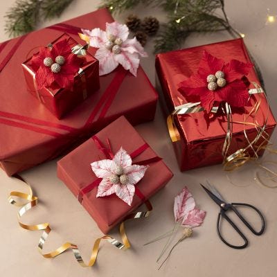 Envoltorio de regalo de estrella de Navidad de papel crespón