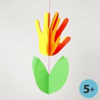 A Neon Coloured Card Flower made from Hands