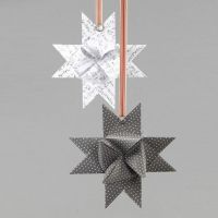 A Split Ring on a woven Vivi Gade Design Paper Star