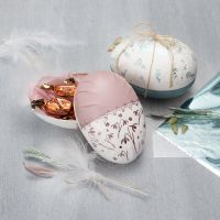 A two-part papier-mâché egg decorated with Plus Color craft paint and deco foil