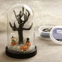 A Halloween miniature world in a dome bell jar