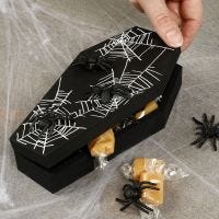 A Halloween coffin with spiders